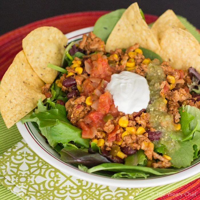 This quick and easy taco salad recipe is perfect for weeknights. The meat is also good for tacos, burritos, or nachos!