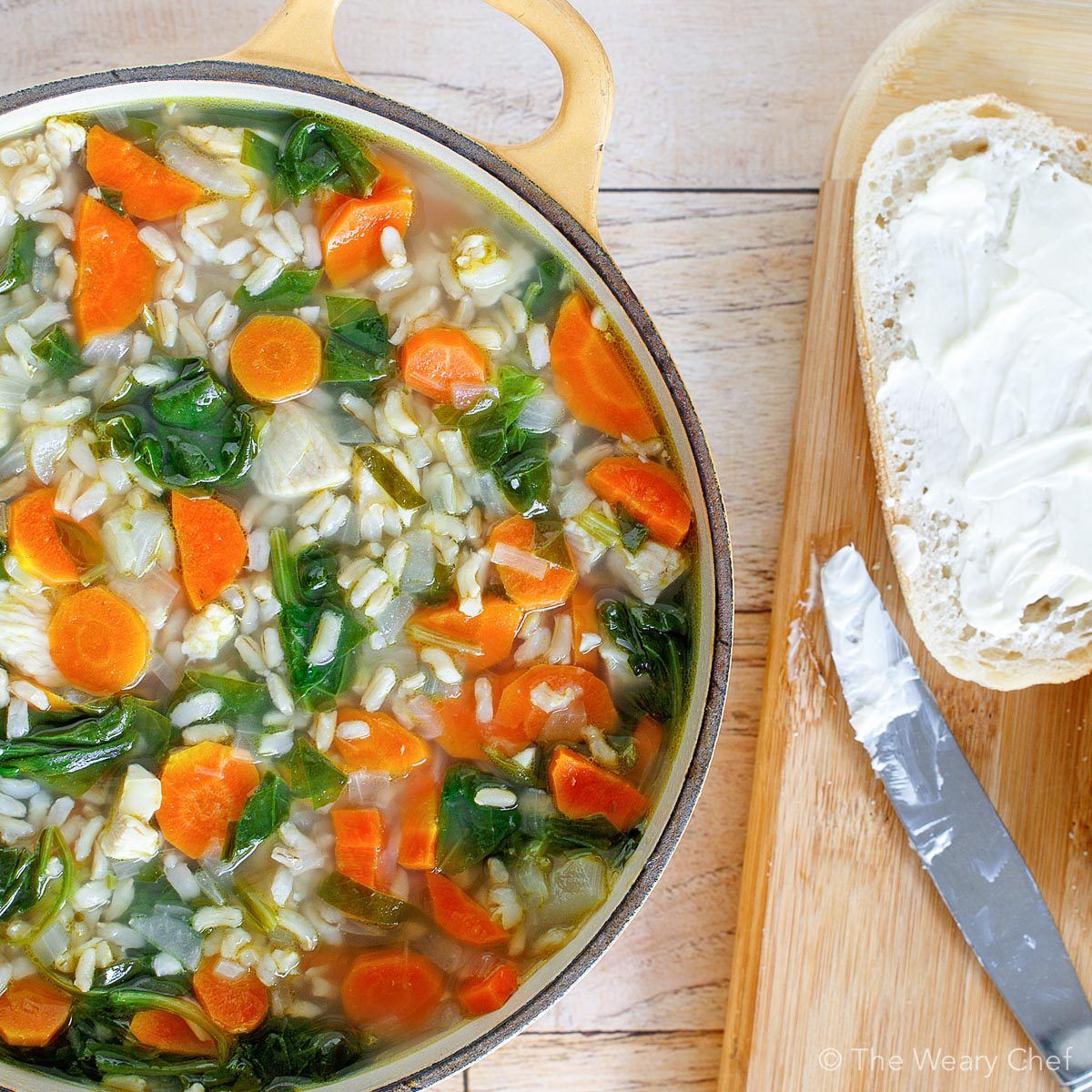 This Lemon Chicken Soup with rice and spinach is light, easy, healthy, and comforting. It will be your go-to dinner recipe on cold days! #lemon #chicken #soup