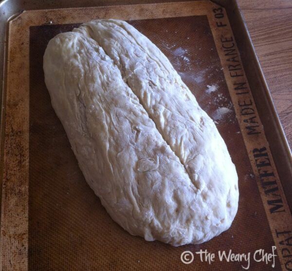 Slice your beer bread dough before baking.