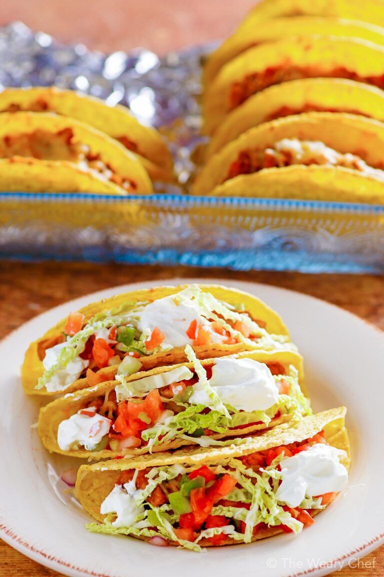 These oven baked tacos are my new favorite way to enjoy this classic dinner! Bake up a pan for your family this week, and enjoy a fun meal together. #tacos #taconight #tacotuesday #oventacos #bakedtacos