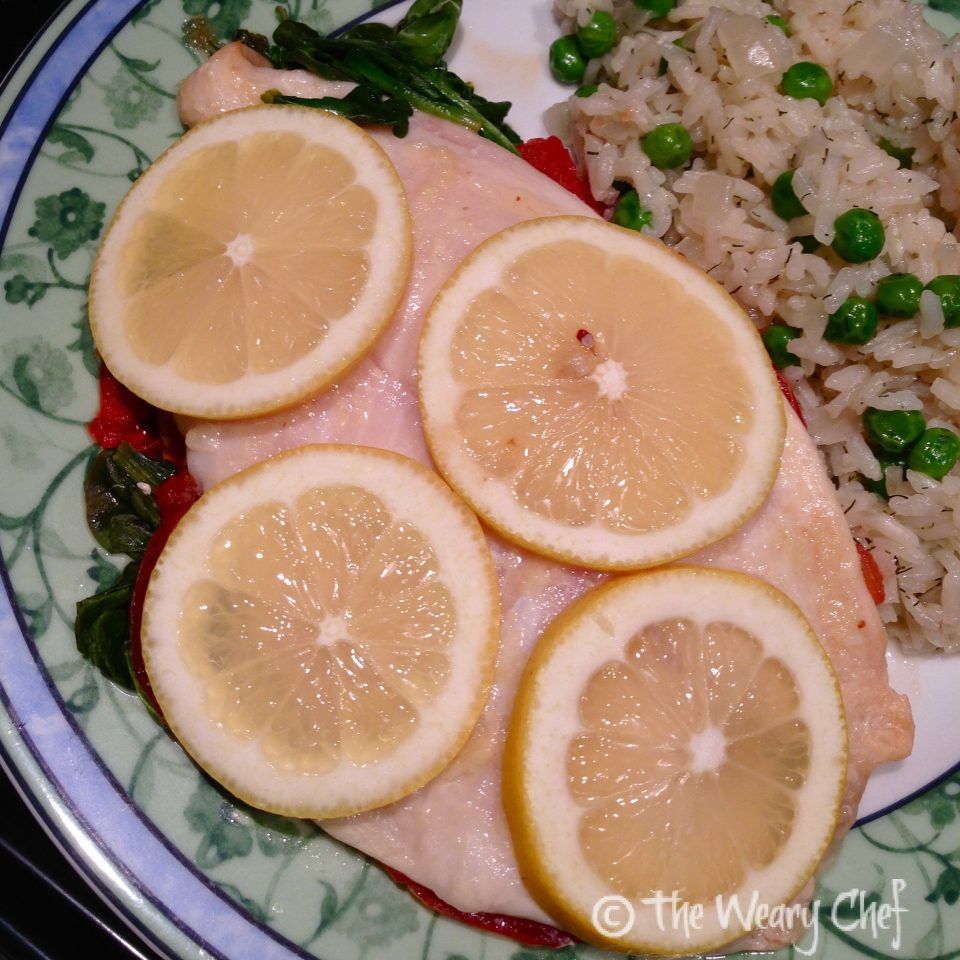 Foil Fish Packets with Spinach, Tomato, and Lemon - Quick to prepare and can be made ahead. Delicious, easy, healthy dinner!