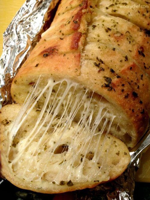 You want this ooey-gooey pesto bread on your dinner table!