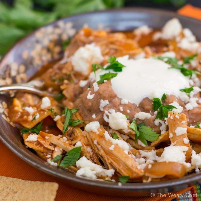 Chilaquiles are like a delicious cross between nachos and enchiladas. You'll want to try this super easy version with chicken!