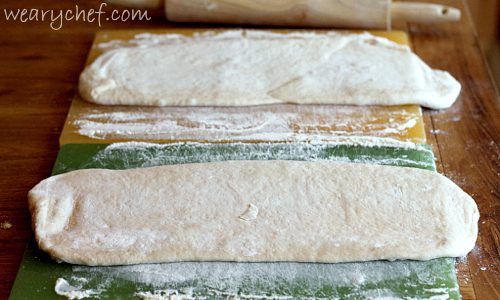 roll two one-pound loaves of thawed bread dough into 1/2" thick rectangles