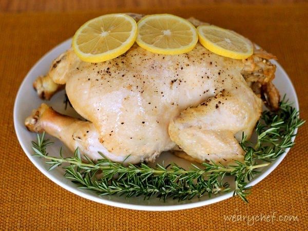 Slow Cooker Roasted Chicken with Lemon and Rosemary | The Weary Chef #slowcooker #chicken Slow Cooker Roasted Chicken with Lemon and Rosemary | The Weary Chef #slowcooker #chicken