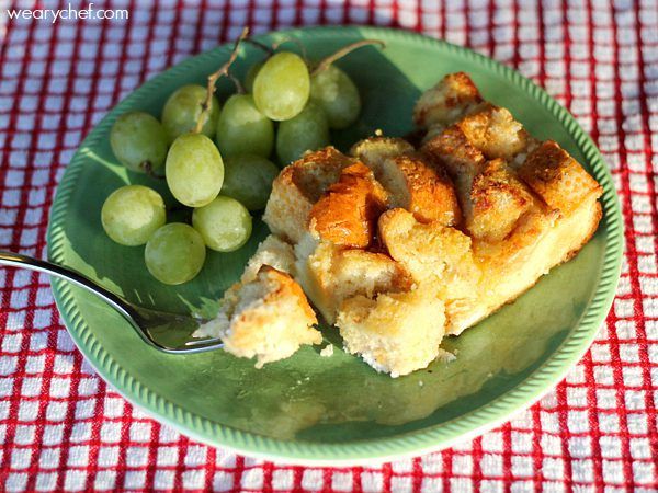 a French Toast Casserole with grapes on a plate