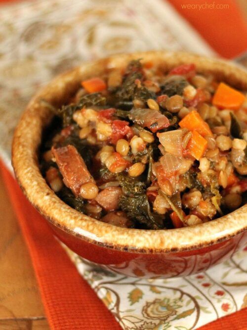 This hearty stew is loaded with sausage, kale, carrots, tomatoes, and lentils. It's a deliciously good-for-you dinner to warm up with on a cool evening!