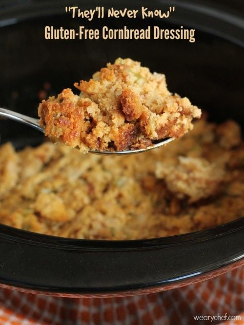 This Gluten-Free Cornbread Dressing is made in your slow cooker and tastes just like the real deal! Perfect Thanksgiving side dish recipe!