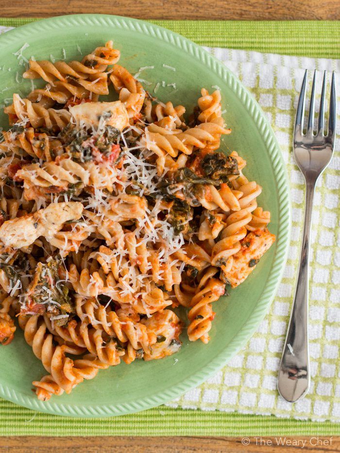 Easy Chicken with Pasta Dinner Recipe - Dress up your spaghetti with chicken, spinach, and a bit of spice!