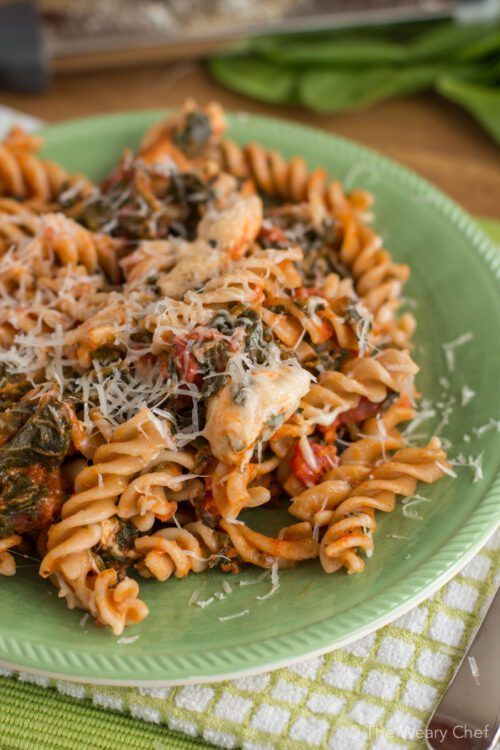 Easy Chicken with Pasta Dinner Recipe - Dress up your spaghetti with chicken, spinach, and a bit of spice!