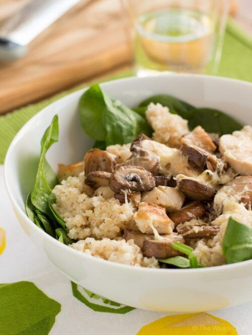 This warm spinach salad with chicken, mushroom, couscous, and a lemon dressing is delicious, healthy, and quick!