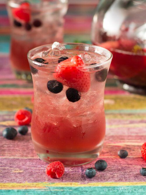 Bursting with strawberry, blueberry, and raspberry flavor, this super easy sangria is just the thing to relax with!