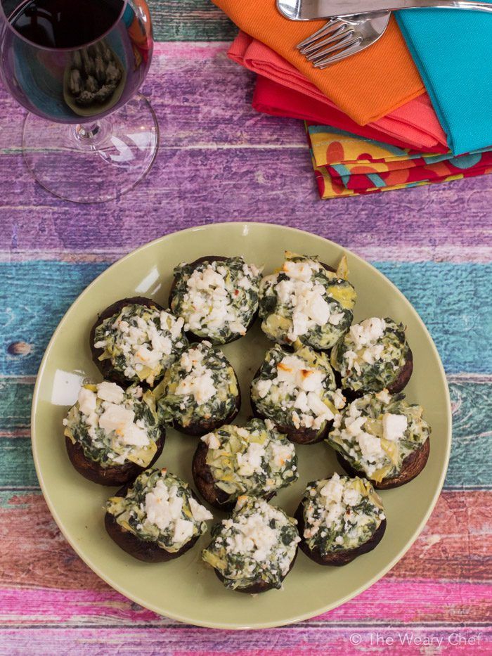 These spinach dip stuffed mushrooms are SO GOOD and really simple to make. Perfect party appetizer!