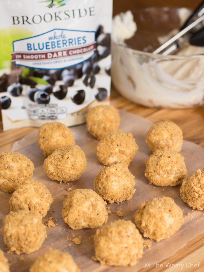 These no-bake cheesecake bites stuffed with dark chocolate blueberries are fun to make and so satisfying!