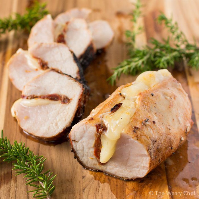 This mesquite flavored pork loin is stuffed with sun-dried tomatoes and provolone for an easy but impressive entree!