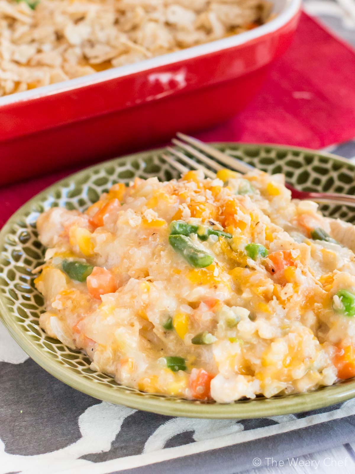 This chicken and vegetable quinoa casserole is loaded with tender chunks of chicken and cheddar cheese, then topped with crunchy tortilla chips. Such a satisfying and easy dinner recipe!