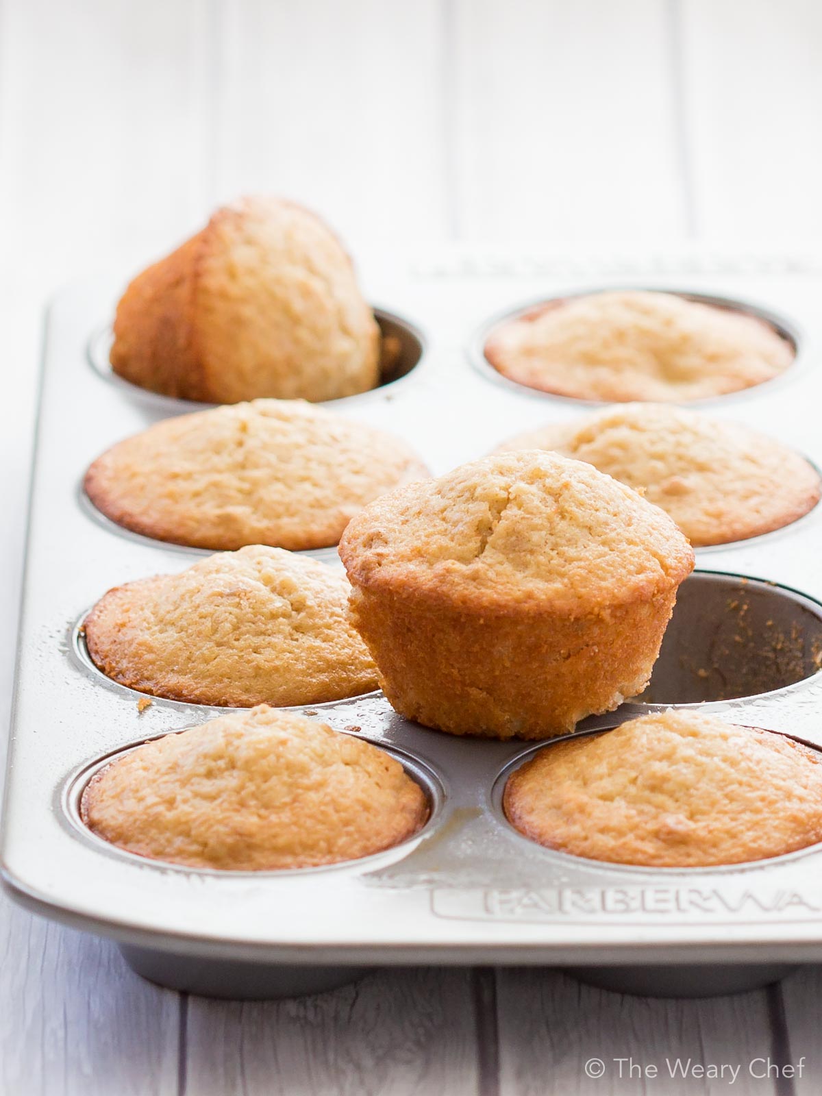 Banana, coconut, and pineapple muffins are made easy and delicious with Greek yogurt and baking mix!