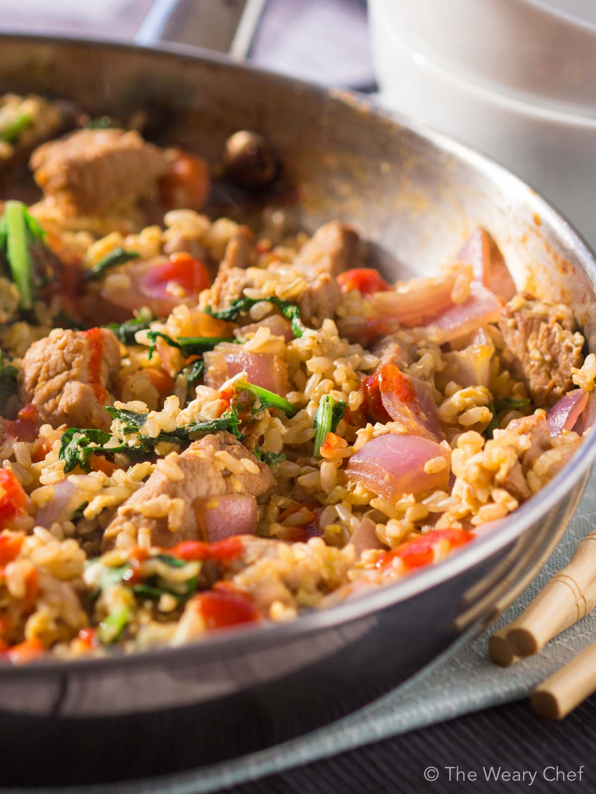 This quick and flavorful pork fried rice can be made in under 20 minutes and is a versatile dinner recipe that uses what you have on hand!