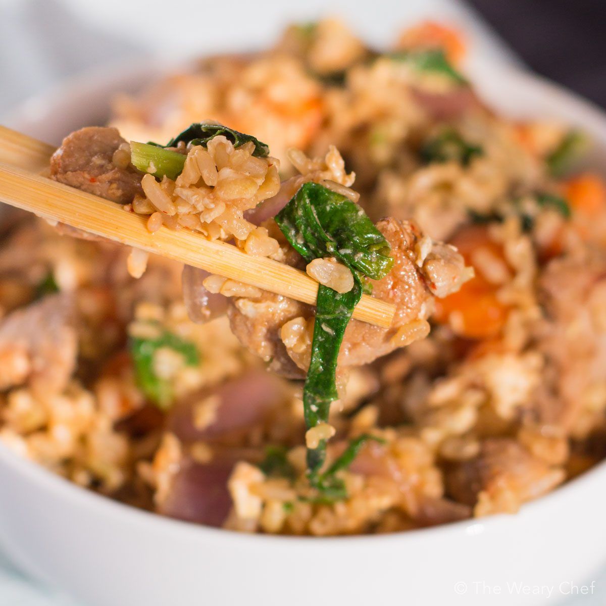 This quick and flavorful pork fried rice can be made in under 20 minutes and is a versatile dinner recipe that uses what you have on hand!