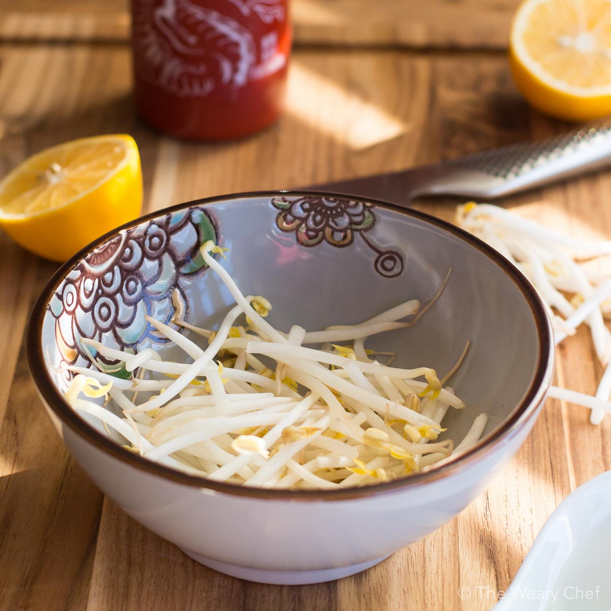 Serving soup over bean sprouts is a tasty and healthy alternative to noodles.