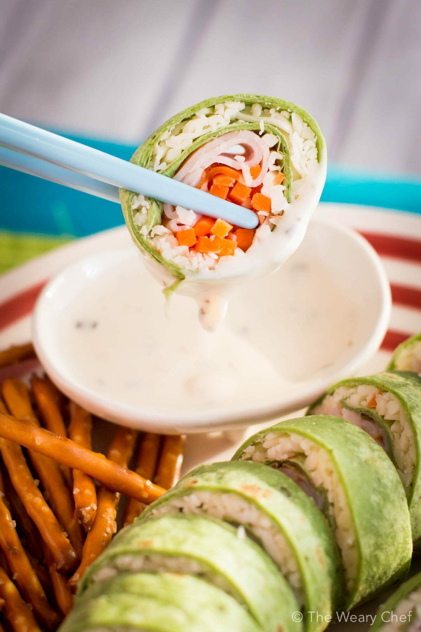 Pack some fun in your child's lunch with these turkey and cheese sushi sandwich rolls!