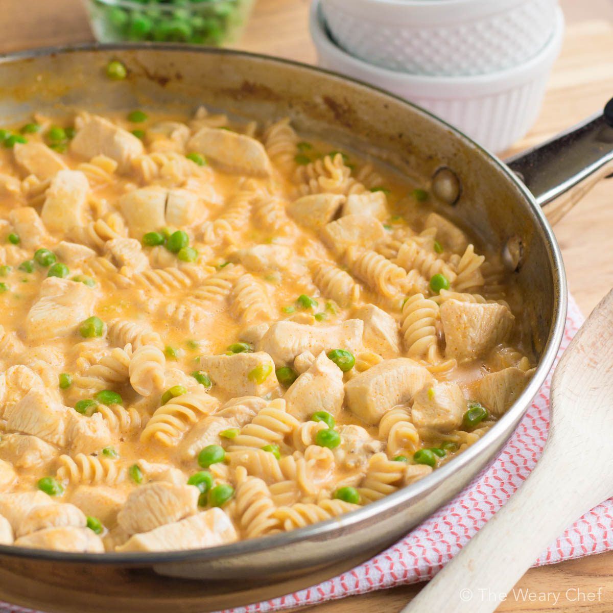 Check out this spicy, tangy, creamy Buffalo Chicken Pasta recipe! It all comes together in one pan in under 30 minutes. You'll love this easy dinner!