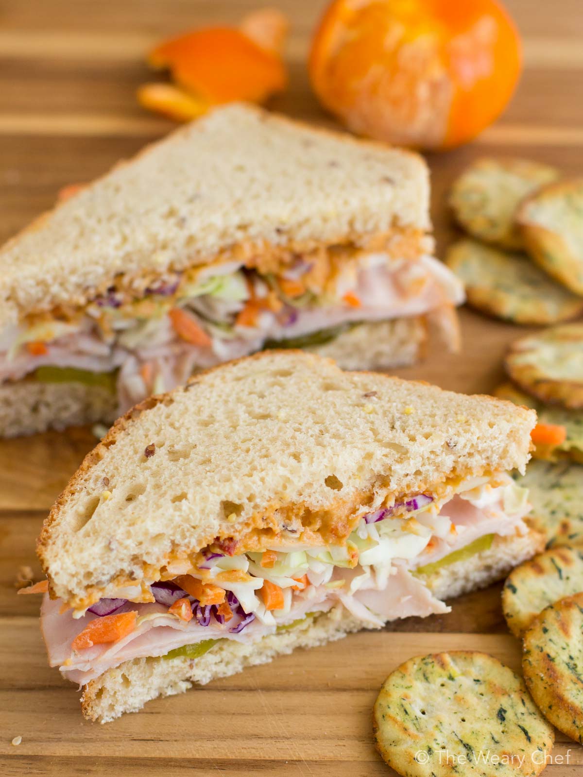 You'll love this easy sandwich for lunch. It features turkey, hummus, pickles, and cabbage for lots of flavor and crunch!