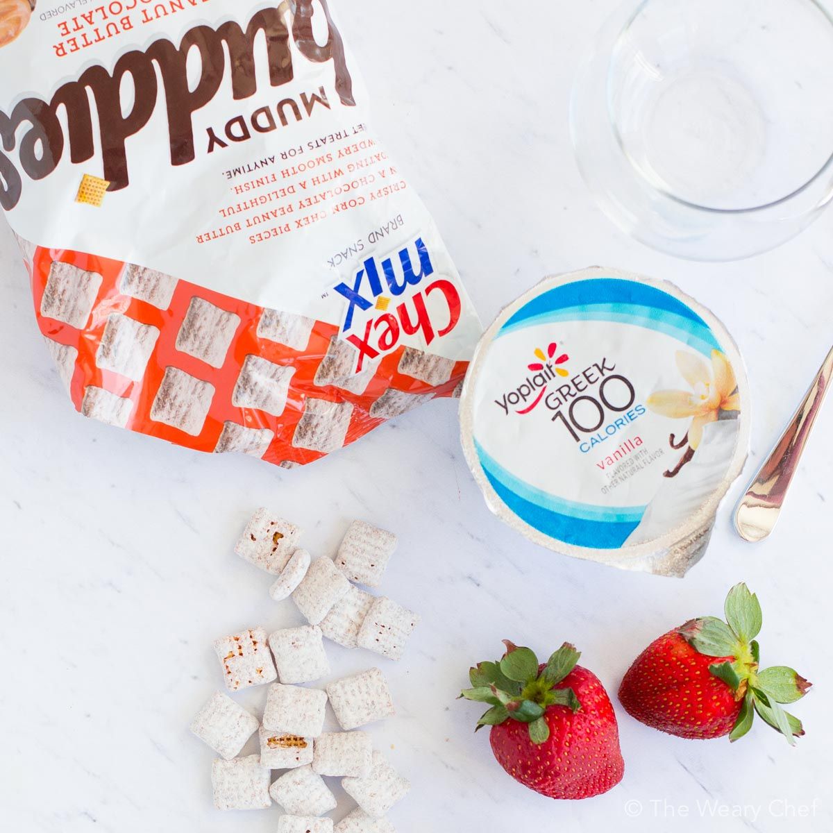 Creamy yogurt, fresh berries, and sweet Muddy Buddies come together to make the perfect snack in these yogurt parfaits! Thanks so much to General Mills for sponsoring today's easy snack idea!