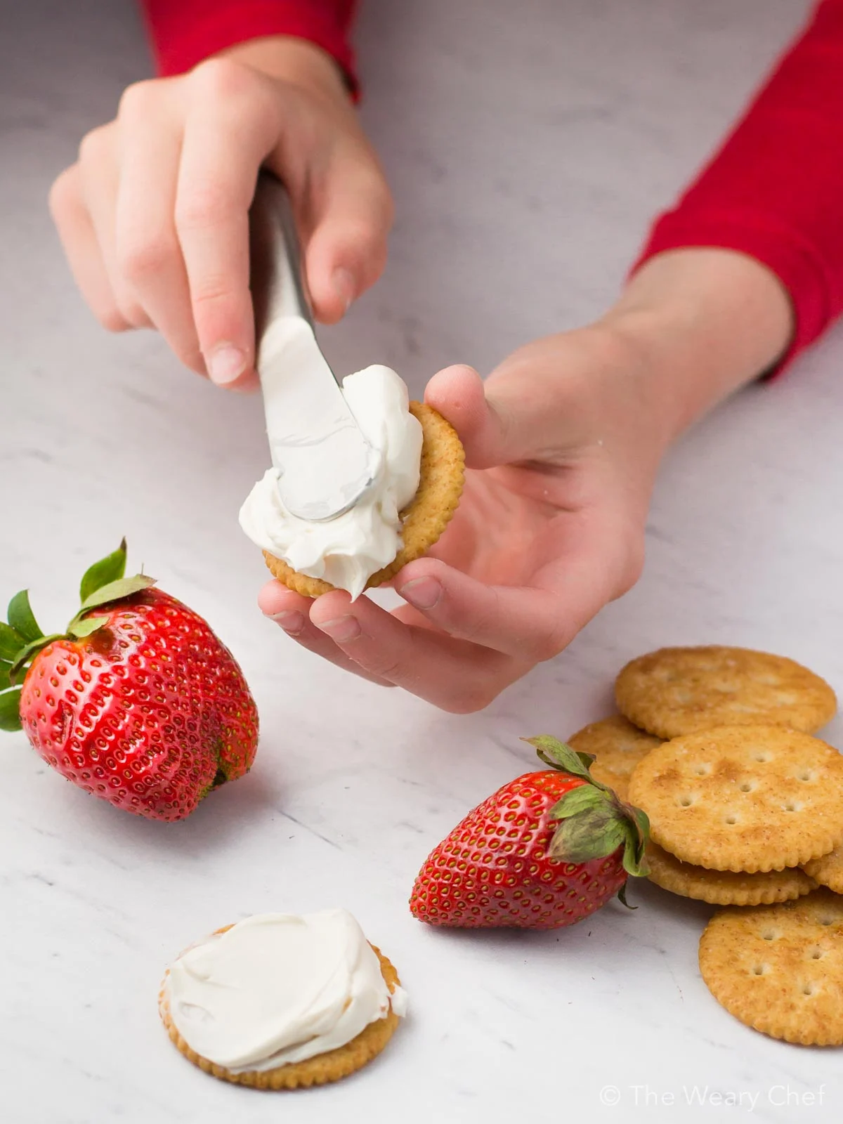 Enjoy a rich moment at home with these quick and easy Strawberry Cheesecake RITZ Sandwiches! Kids and grownups both love them!