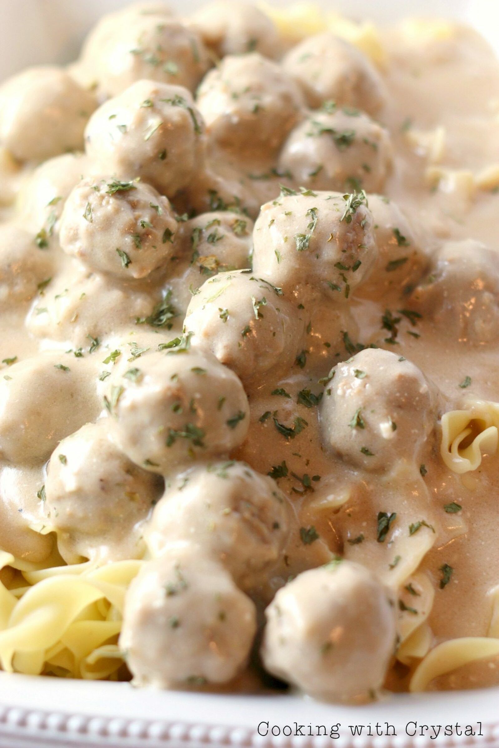 Easy Swedish Meatballs Recipe over Egg Noodles - The Weary Chef