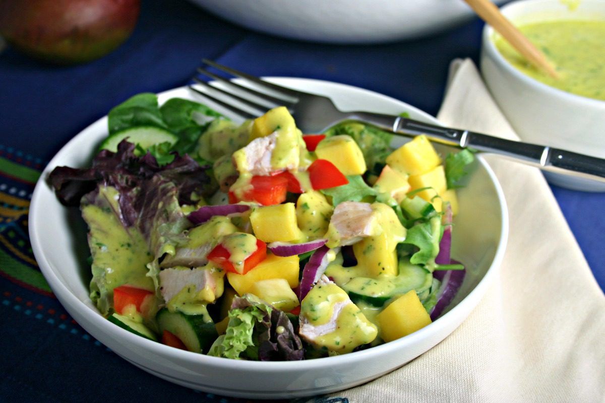 Enjoy this fresh chopped salad with mango vinaigrette for dinner tonight!