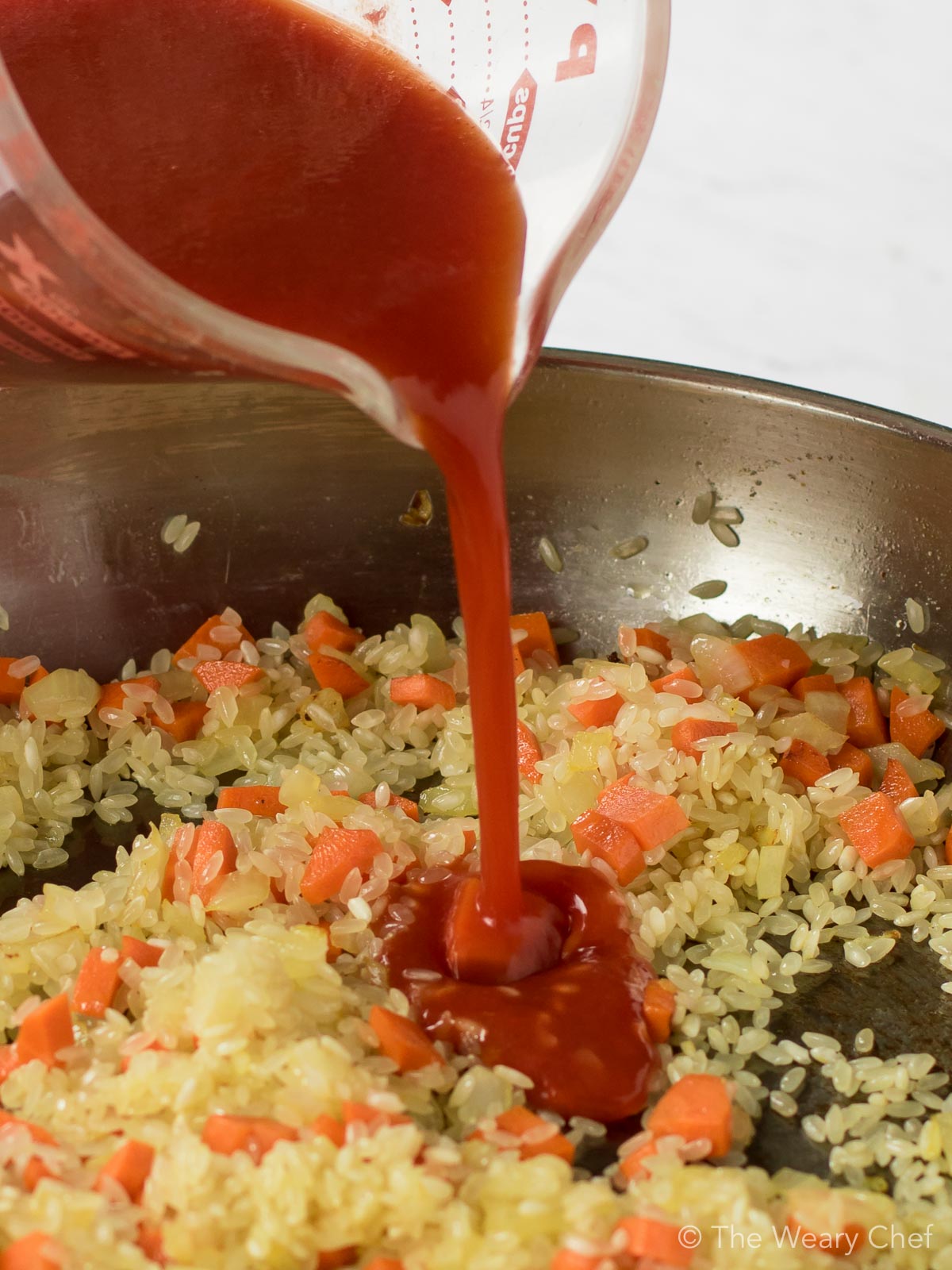 Homemade Mexican Rice is made even better with Organic Tomato Red Bell Pepper Juice!