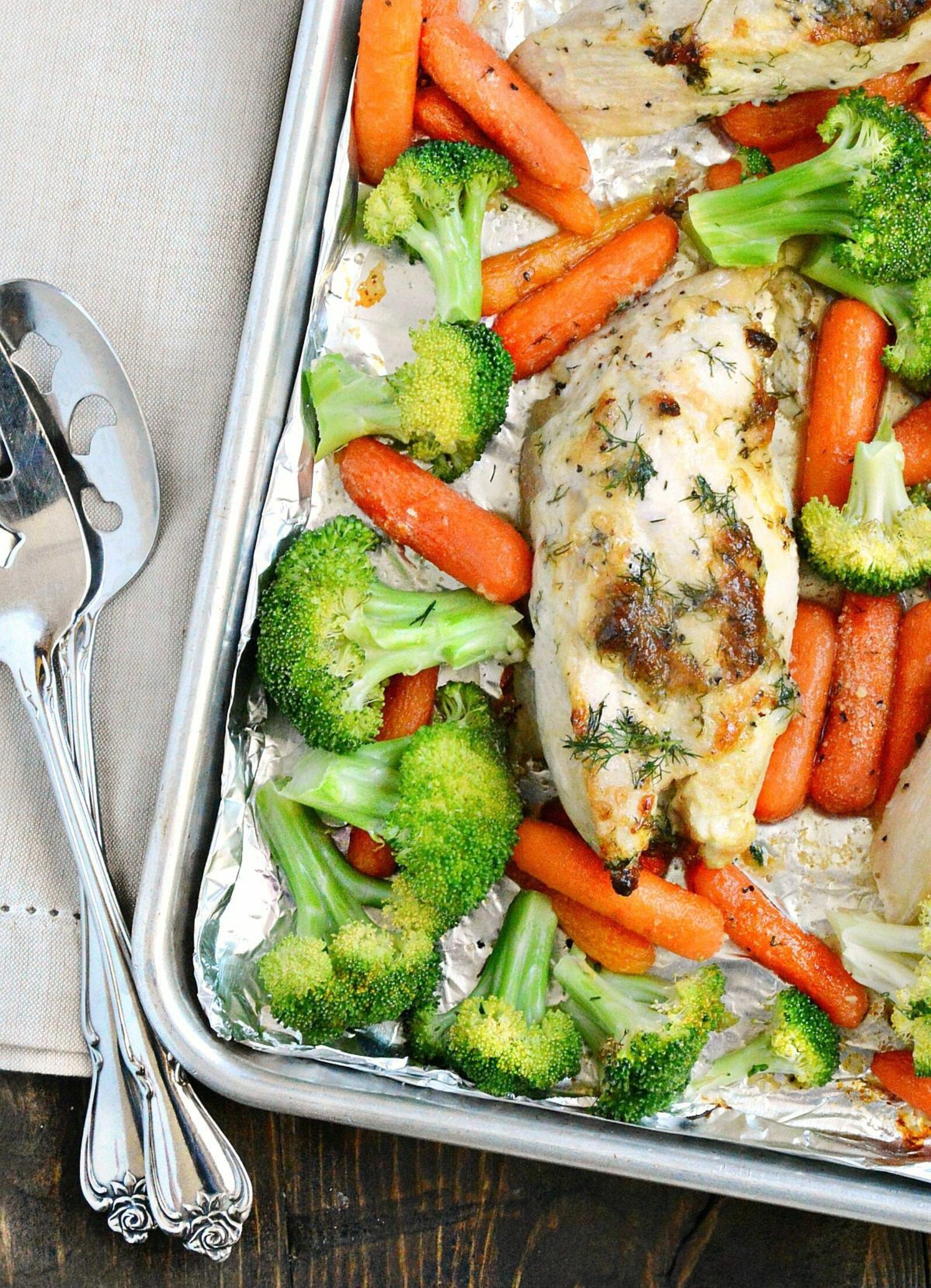 This aromatic Dill Chicken Sheet Pan Dinner with fresh carrots and broccoli is a quick and easy meal that your family will love!