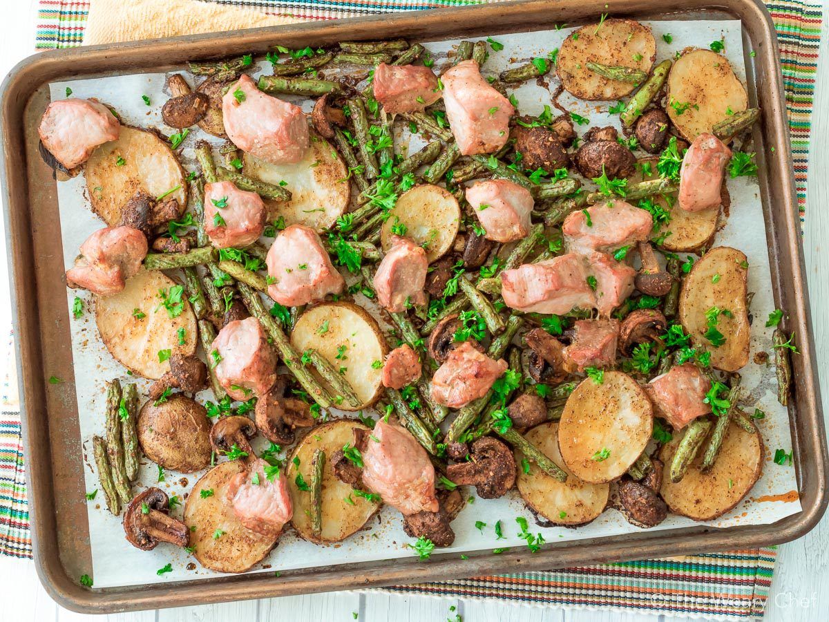 This pork tenderloin sheet pan dinner with potatoes, green beans, and mushrooms only takes about 15 minutes to prep and 30 minutes to bake. Super easy for busy nights!