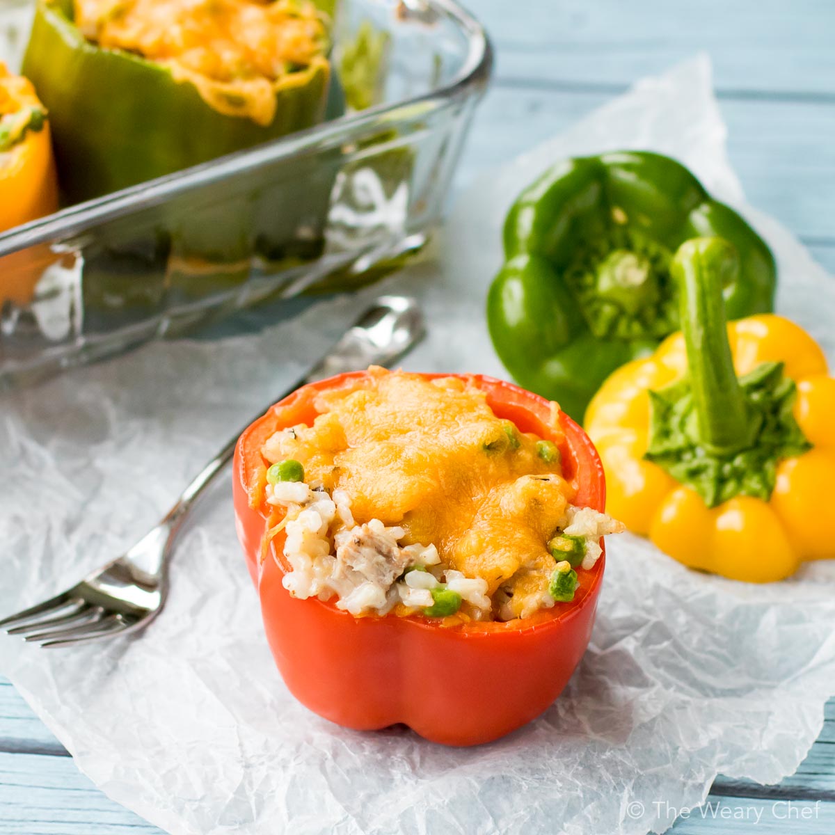 Dinner doesn't get easier than these pork and rice stuffed peppers! You only need six ingredients and a little time to get these cheesy peppers on the table tonight!