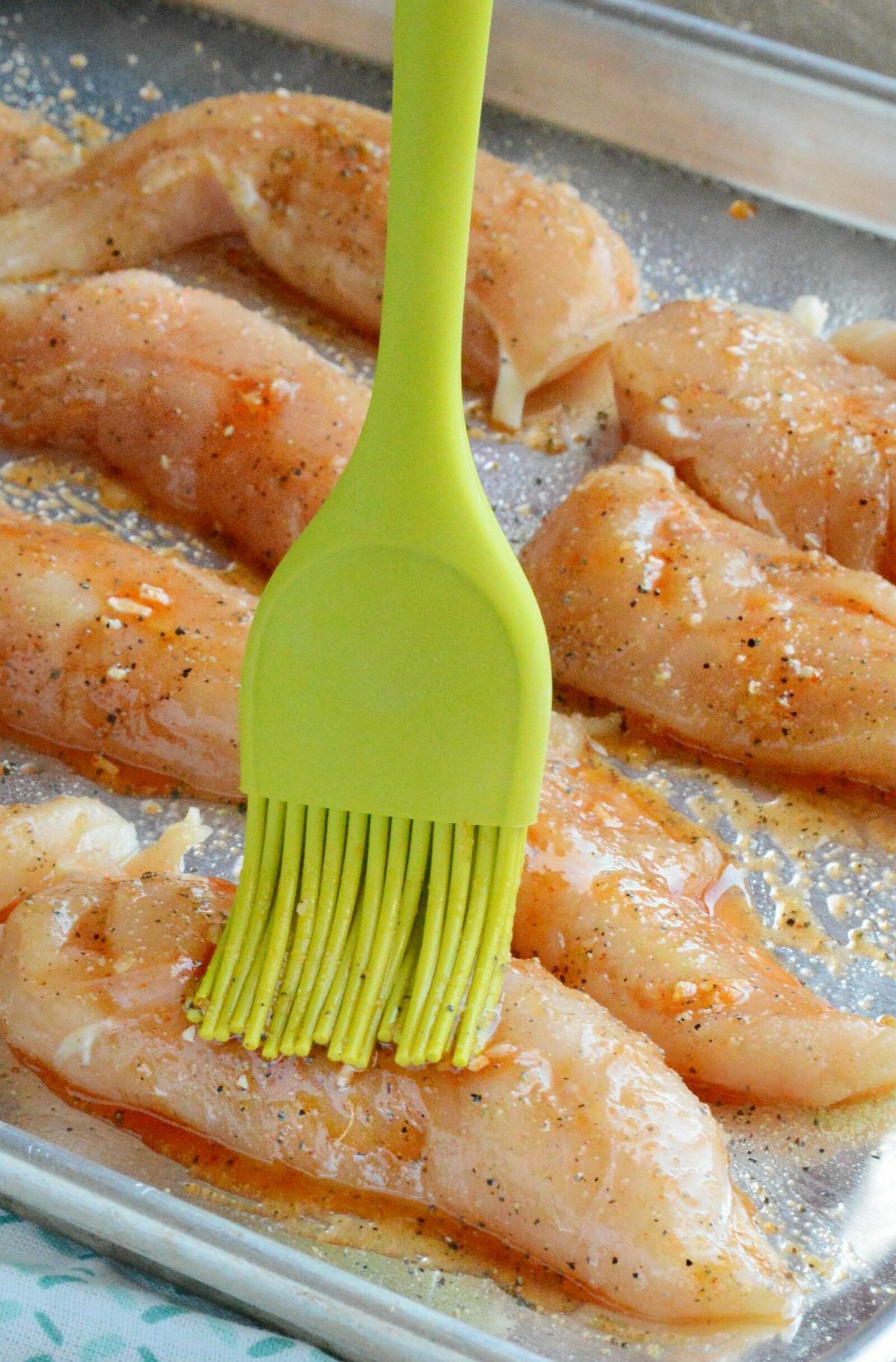 Honey Sriracha Chicken Tenders are a perfect family meal or game day snack. Serve them with homemade ranch for dipping!