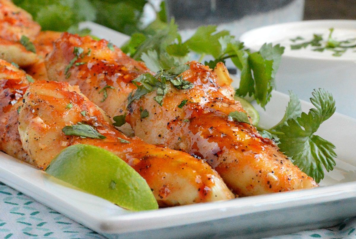 Honey Sriracha Chicken Tenders are a perfect family meal or game day snack. Serve them with homemade ranch for dipping! You'll love the sweet, spicy, tangy flavor combination.