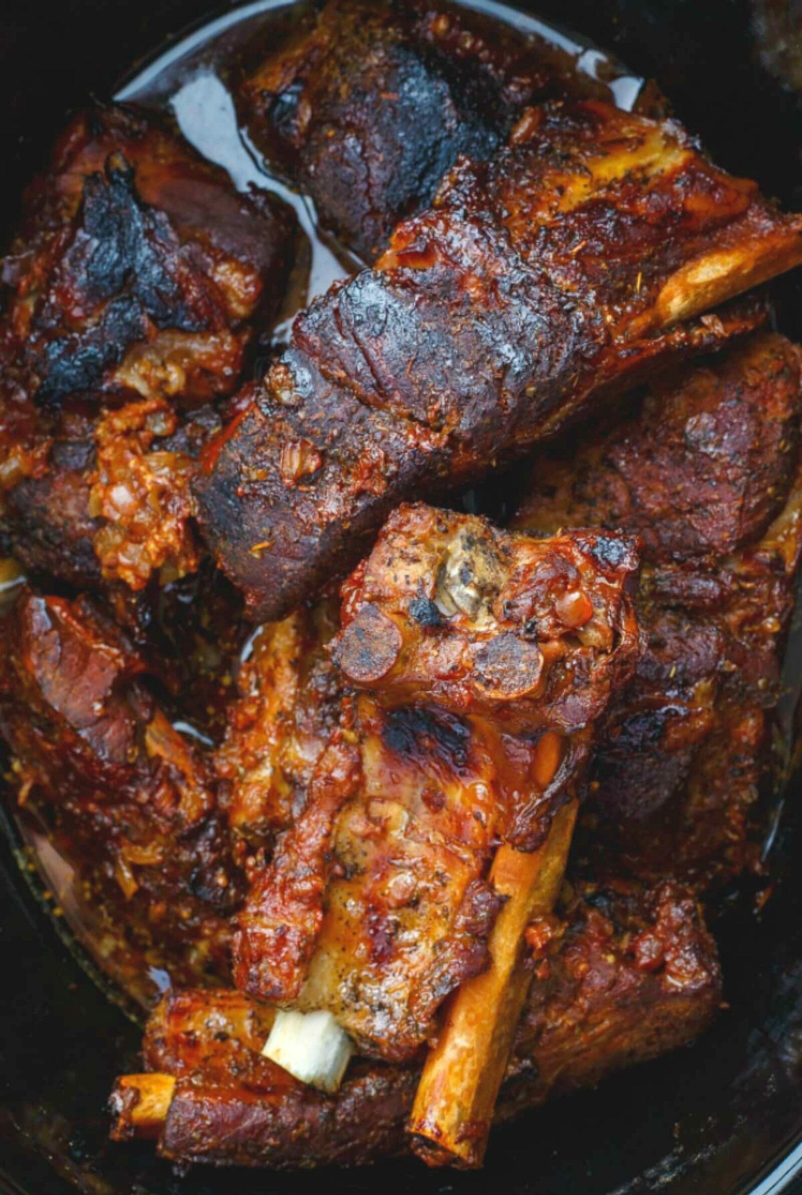 Quick, simple, and great during any season, these slow cooker Asian ribs melt right off the bone! Easy to make gluten free, and perfect for busy nights.