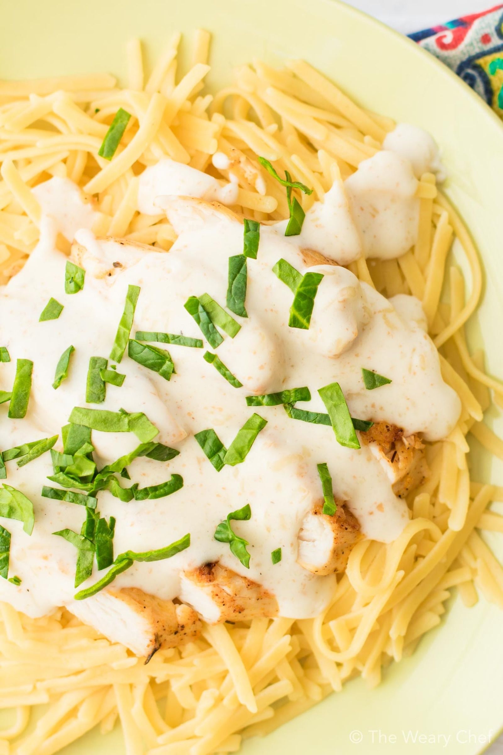 This lightened up chicken alfredo pasta is easy to prepare. It's perfect for special occasions or weeknight family dinners!