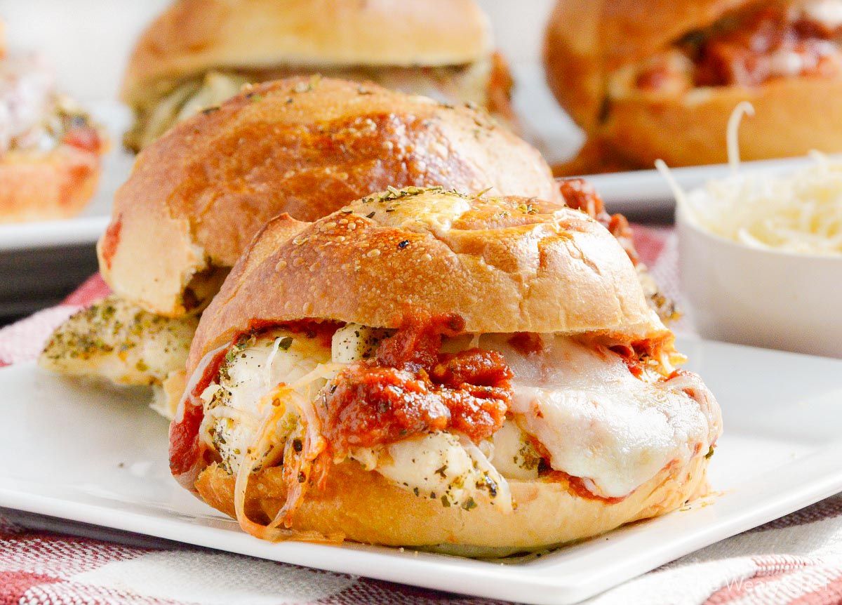 These Italian chicken sliders taste like chicken parmesan on a bun. They are ready in about 20 minutes and are a perfect family dinner recipe!