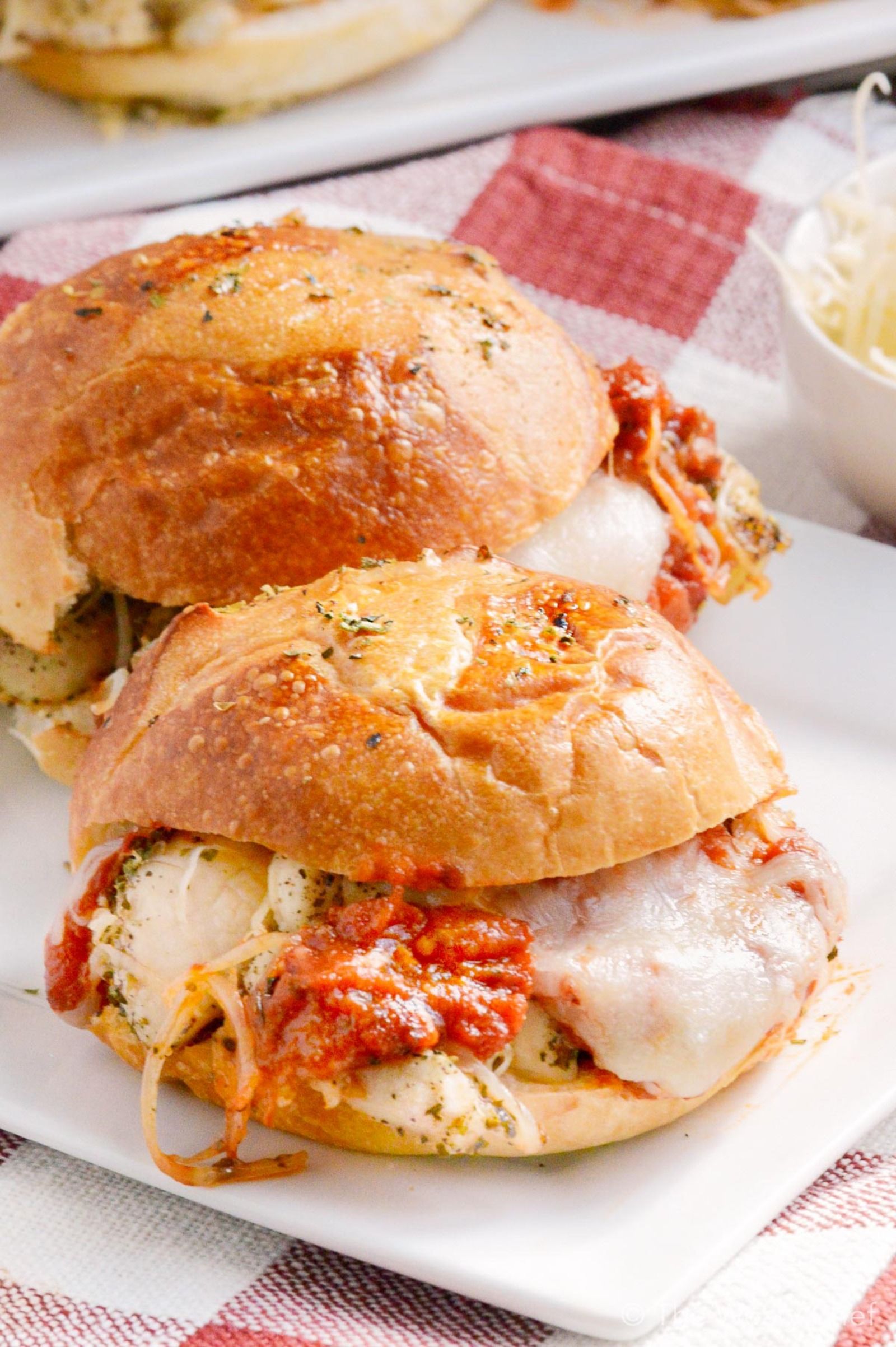 These Italian chicken sliders taste like chicken parmesan on a bun. They are ready in about 20 minutes and are a perfect family dinner recipe!