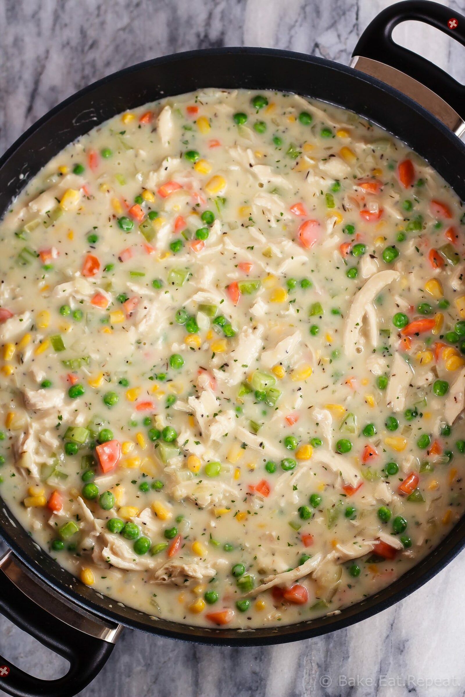 This homemade, from scratch chicken pot pie is actually super easy to make. One of our favorite meals, this easy chicken pot pie is comfort food at it's finest!