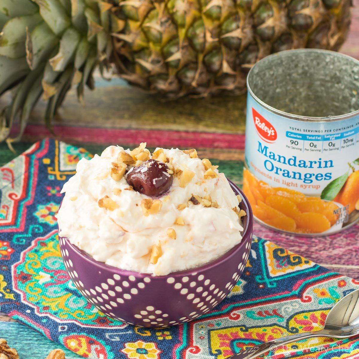 Ambrosia Fruit Salad is a classic easy dessert recipe! Add in canned or fresh fruits, and be a potluck hero!