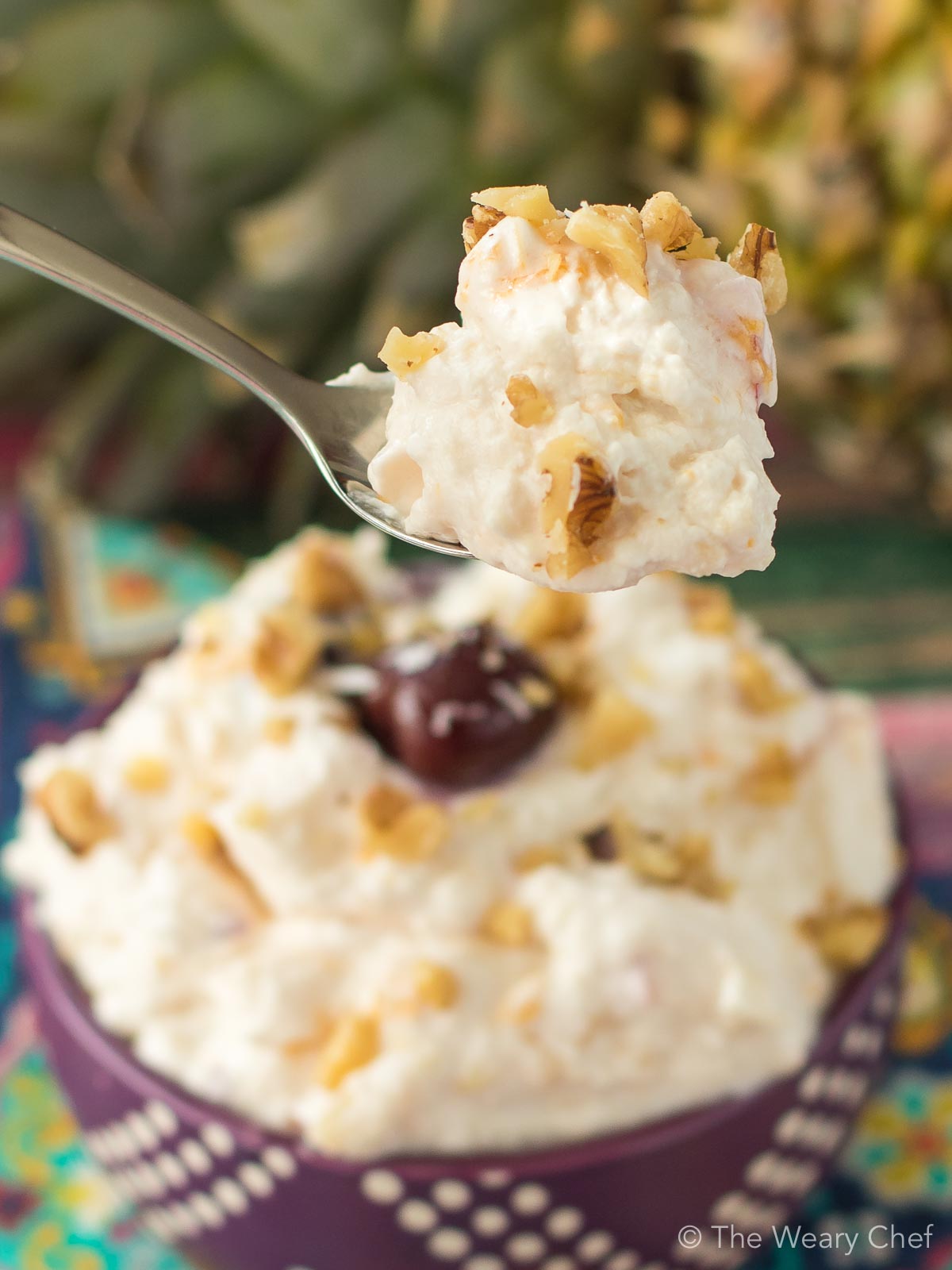 Ambrosia Fruit Salad is a classic easy dessert recipe! Add in canned or fresh fruits, and be a potluck hero!