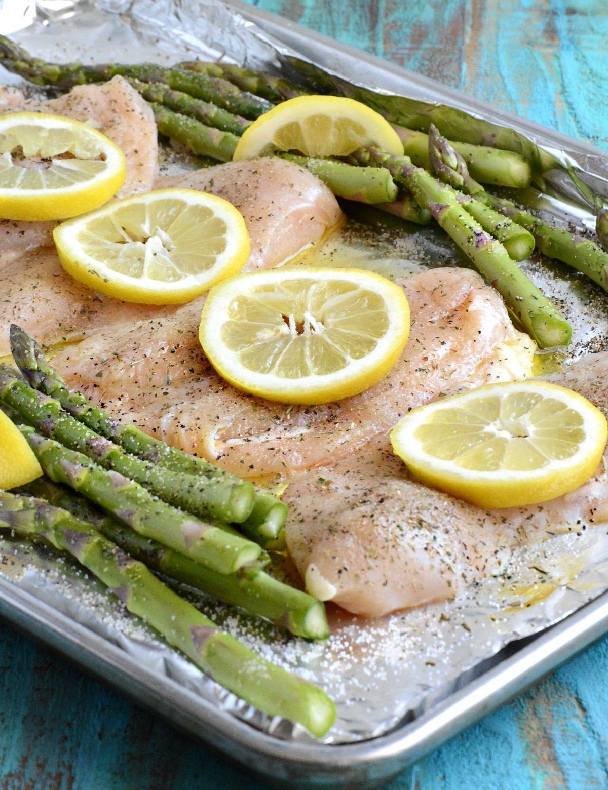 This light and fresh tasting Lemon Butter Chicken Sheet Pan Meal is just right for dinner any time! Quick prep and bake time means you can get it on the table in a hurry!