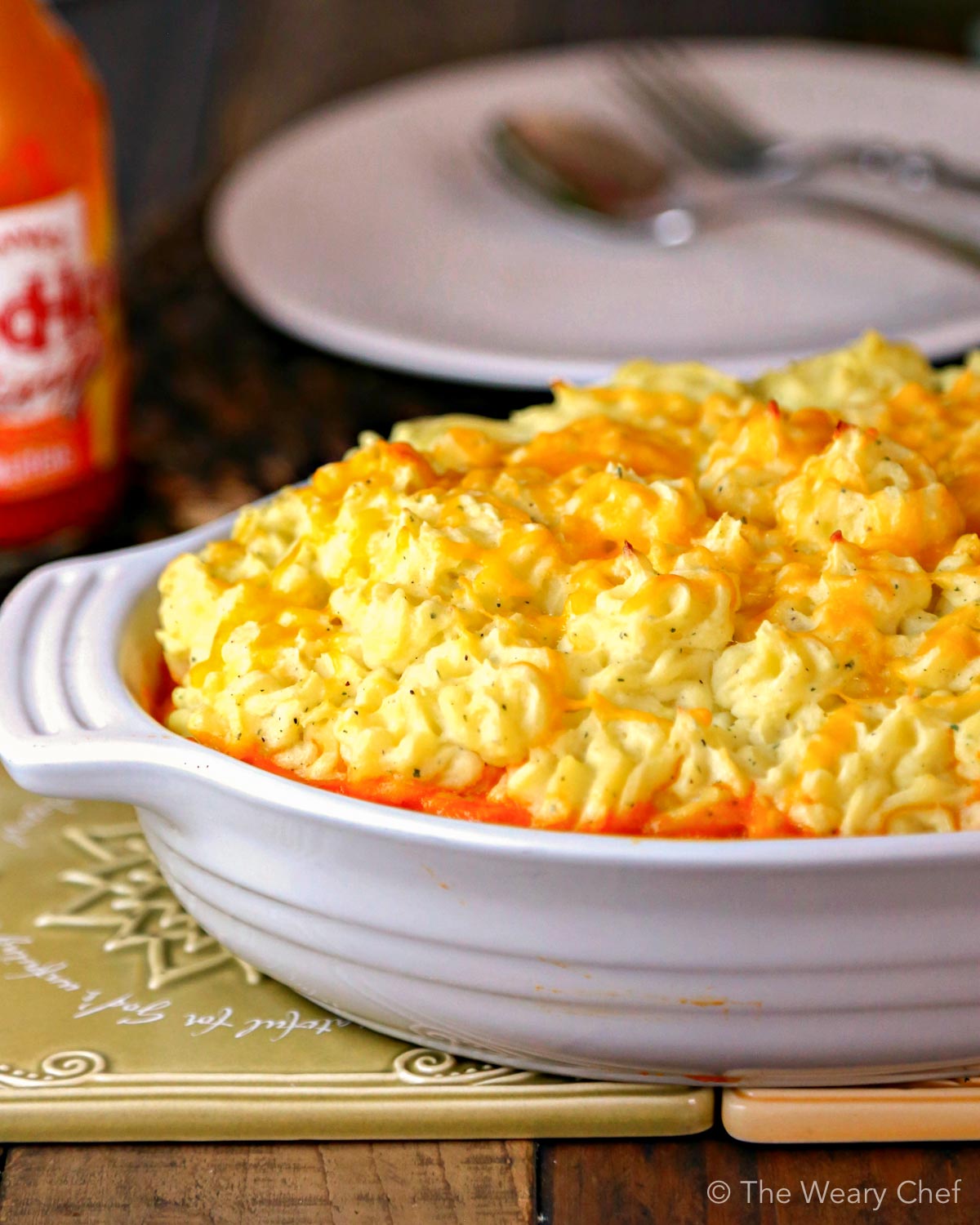 Classic Buffalo Chicken Dip is reinvented into a comforting family dinner—Buffalo Chicken Shepherd’s Pie with Ranch Mashed Potatoes!