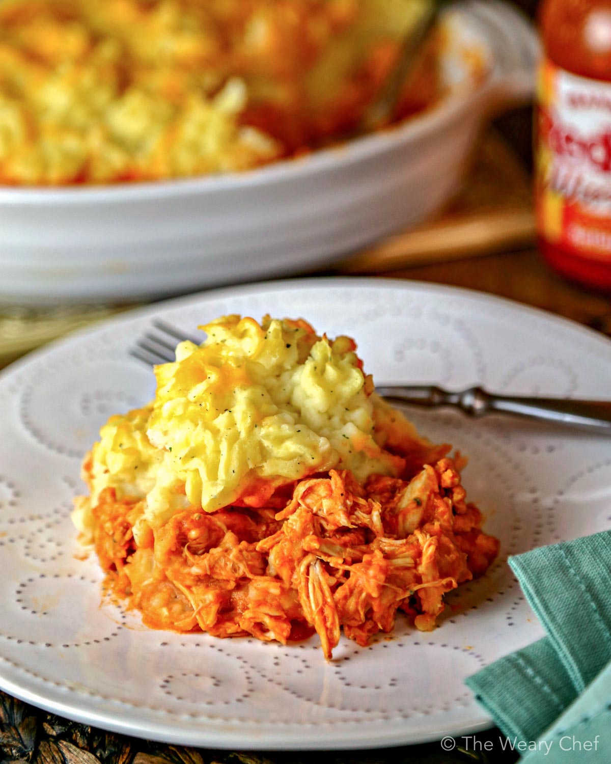 Classic Buffalo Chicken Dip is reinvented into a comforting family dinner—Buffalo Chicken Shepherd’s Pie with Ranch Mashed Potatoes!