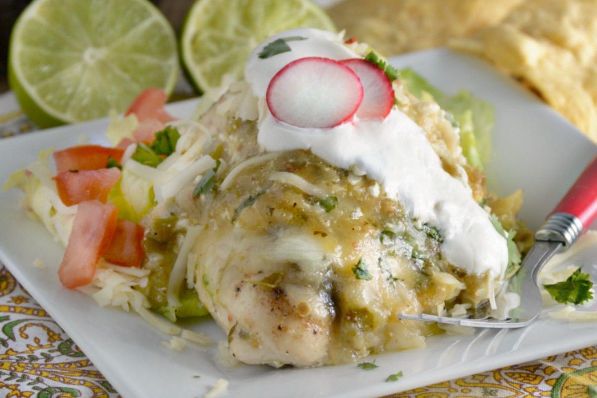 This easy Green Salsa Chicken is sure to satisfy your Mexican food craving! It's ready in about a half hour with very quick prep. Perfect dinner for busy days!