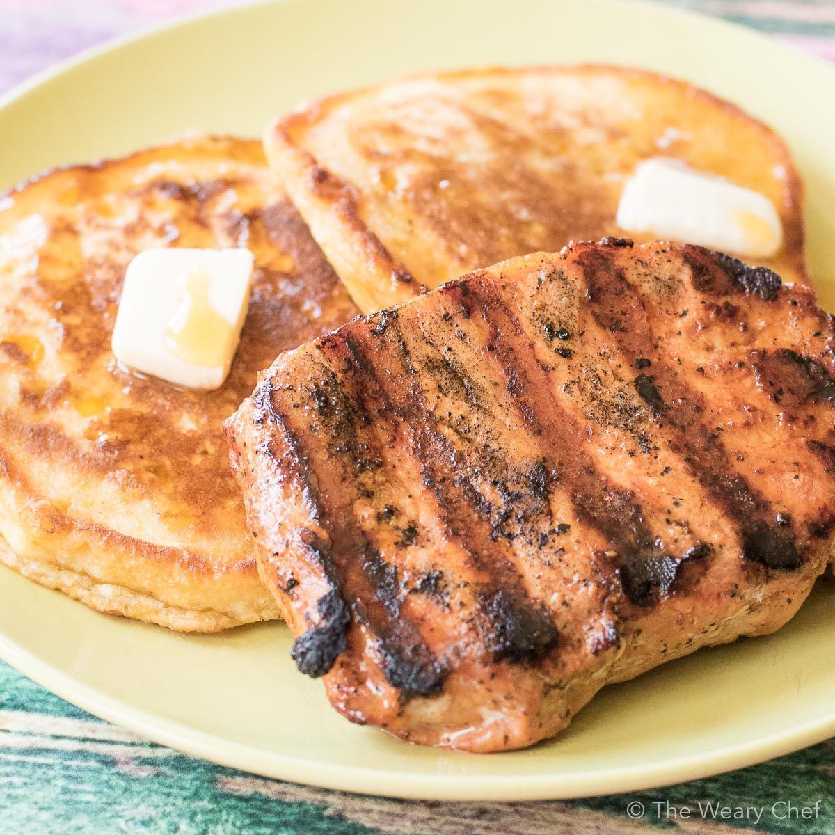 Easy Cream Corn Pancakes paired with freshly grilled pork chops makes for a delicious breakfast or dinner! {30 minute meal | breakfast for dinner }