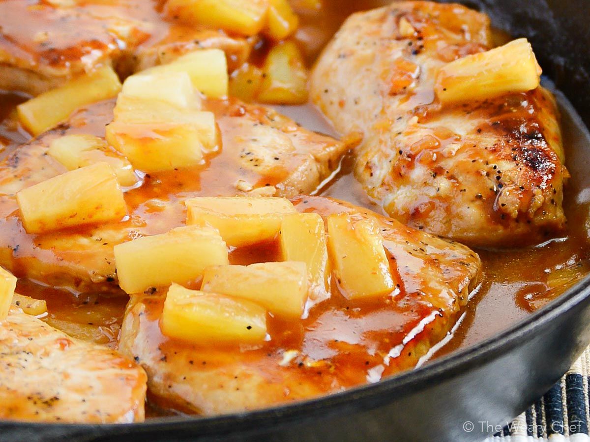 These skillet BBQ Pork Chops with Pineapple are a delicious dinner you'll want to remember for busy nights! #pineapple #porkchops #dinner #recipe #pork